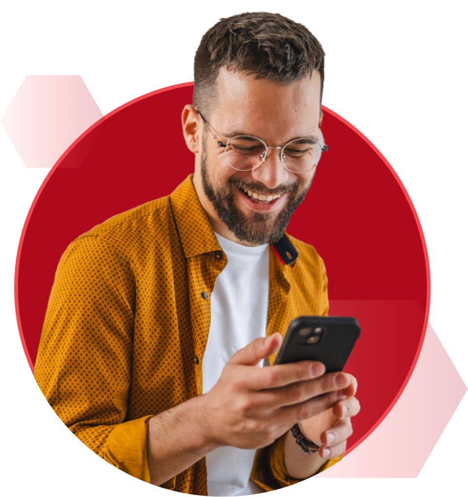 man smiling at phone in front of hexagonal background